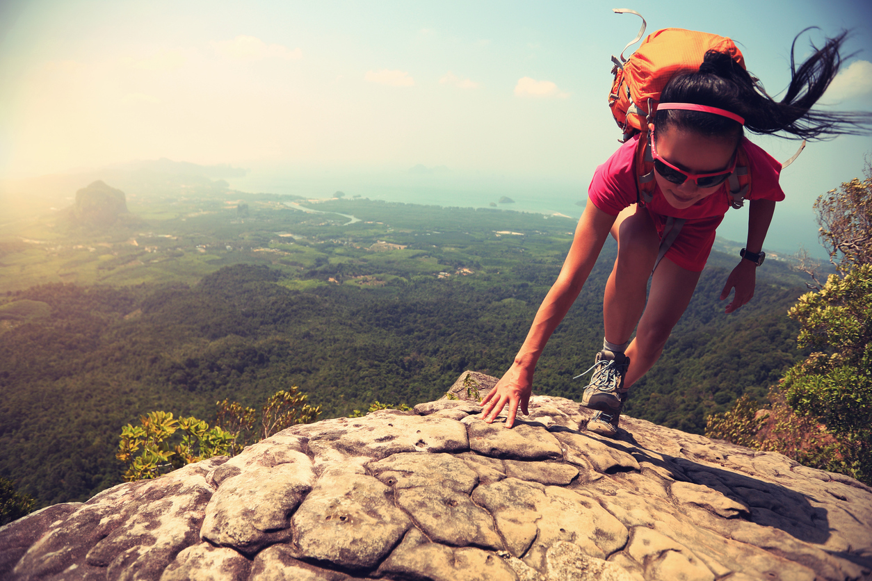 What would you do with a little more energy? Be like this hiker climbing rock on mountain peak cliff?